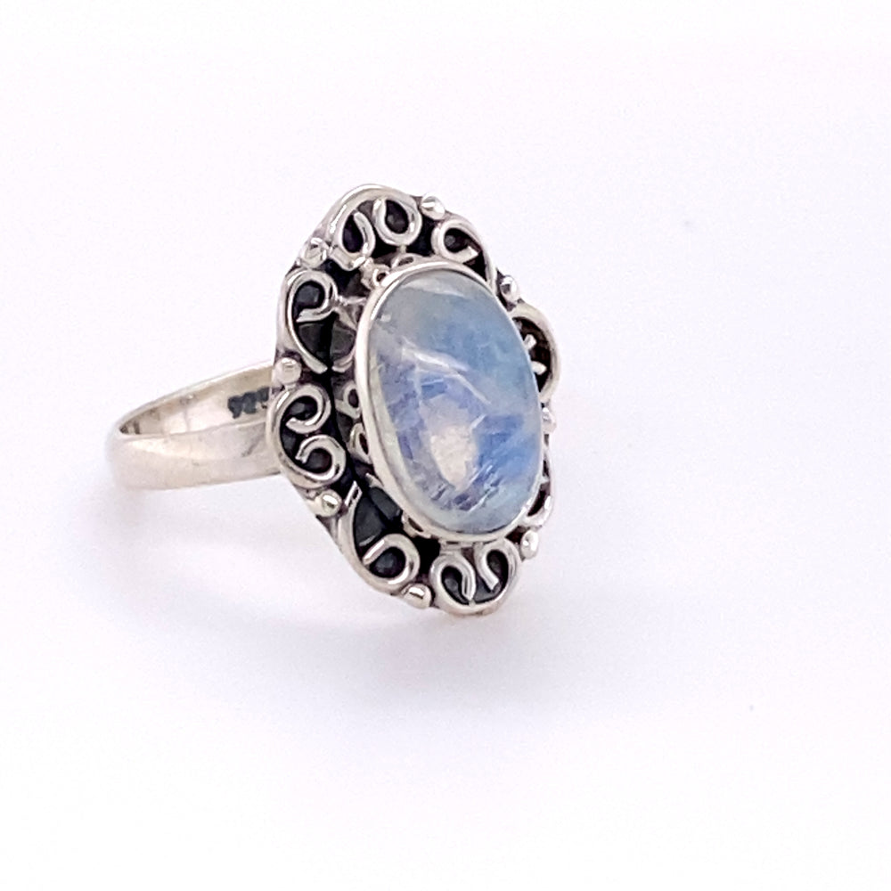 
                  
                    Elegant Oval Gemstone Ring with Swirl Filigree Border in sterling silver from Super Silver.
                  
                