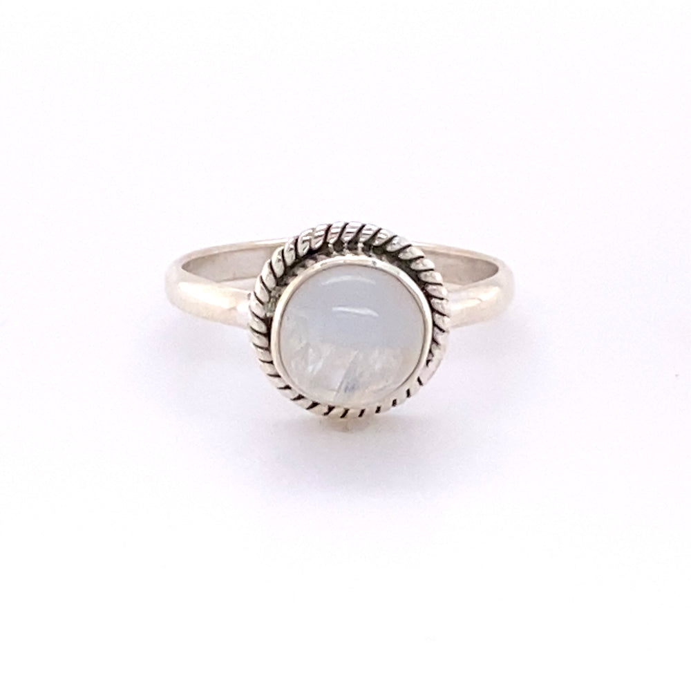 
                  
                    A boho-inspired sterling silver Simple Round Gemstone Ring with Rope Border on a white background.
                  
                