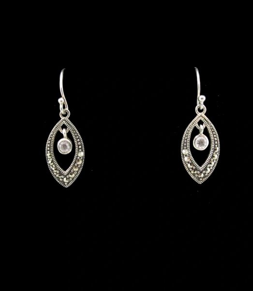 A pair of Super Silver Marcasite Oval Dangle Earrings with diamonds on them.