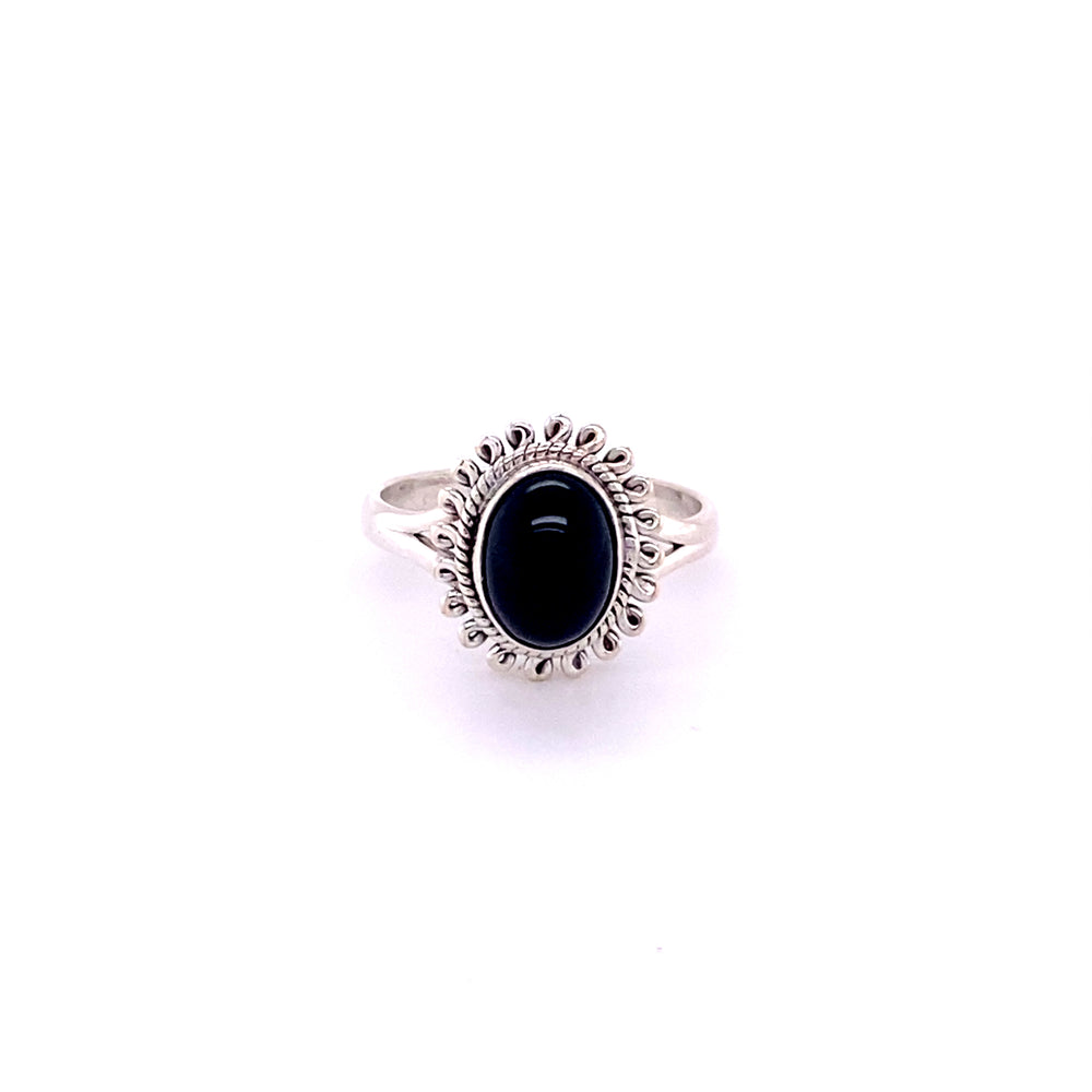 
                  
                    A Hippie-Chic Oval Gemstone Flower Ring with a black stone in the center.
                  
                