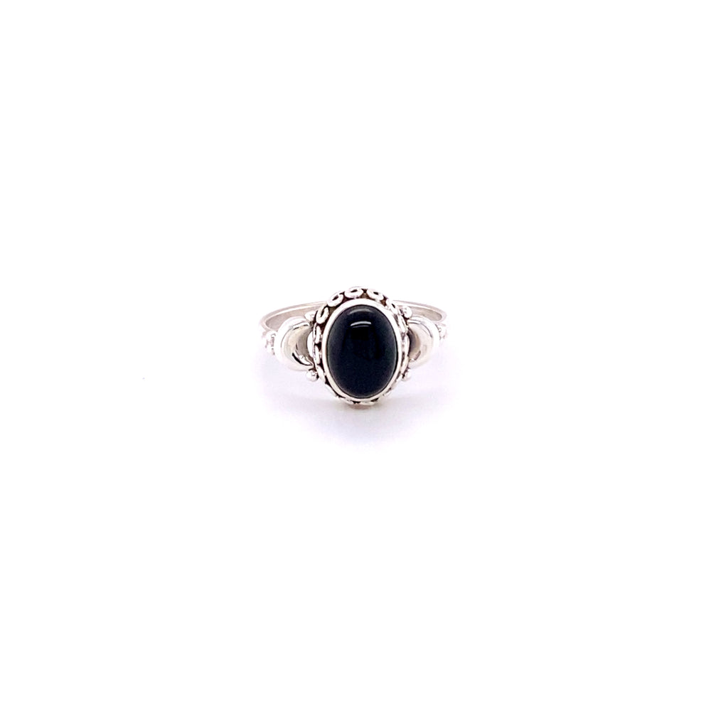 
                  
                    An oval black stone ring on a white background, reminiscent of the earthy and enchanting crescent moon. A Super Silver Beautiful Oval Gemstone Ring with Small Moons that exudes mystique and elegance.
                  
                