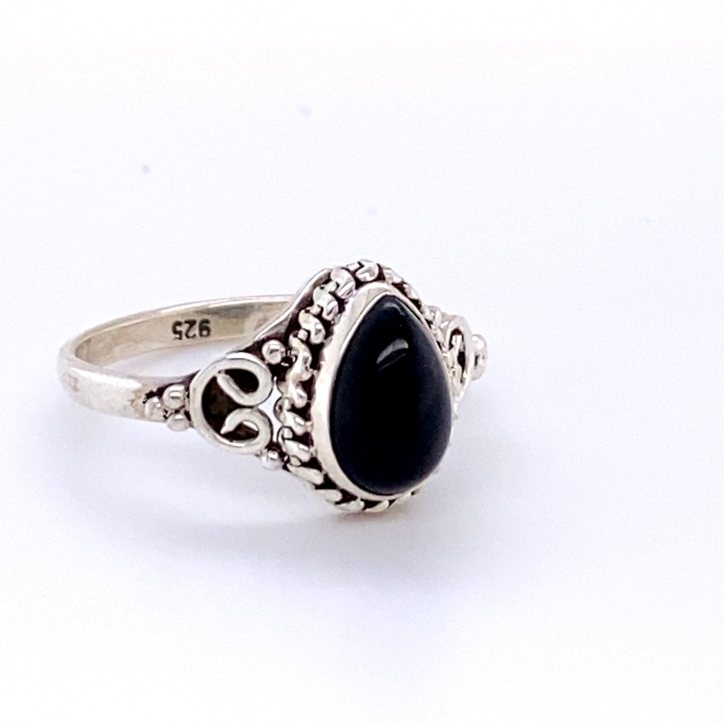 
                  
                    A boho-inspired Teardrop Gemstone Ring with Intricate Ball Border.
                  
                