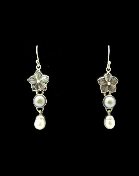A pair of Super Silver Pearl Flower Beaded Dangle Earrings.