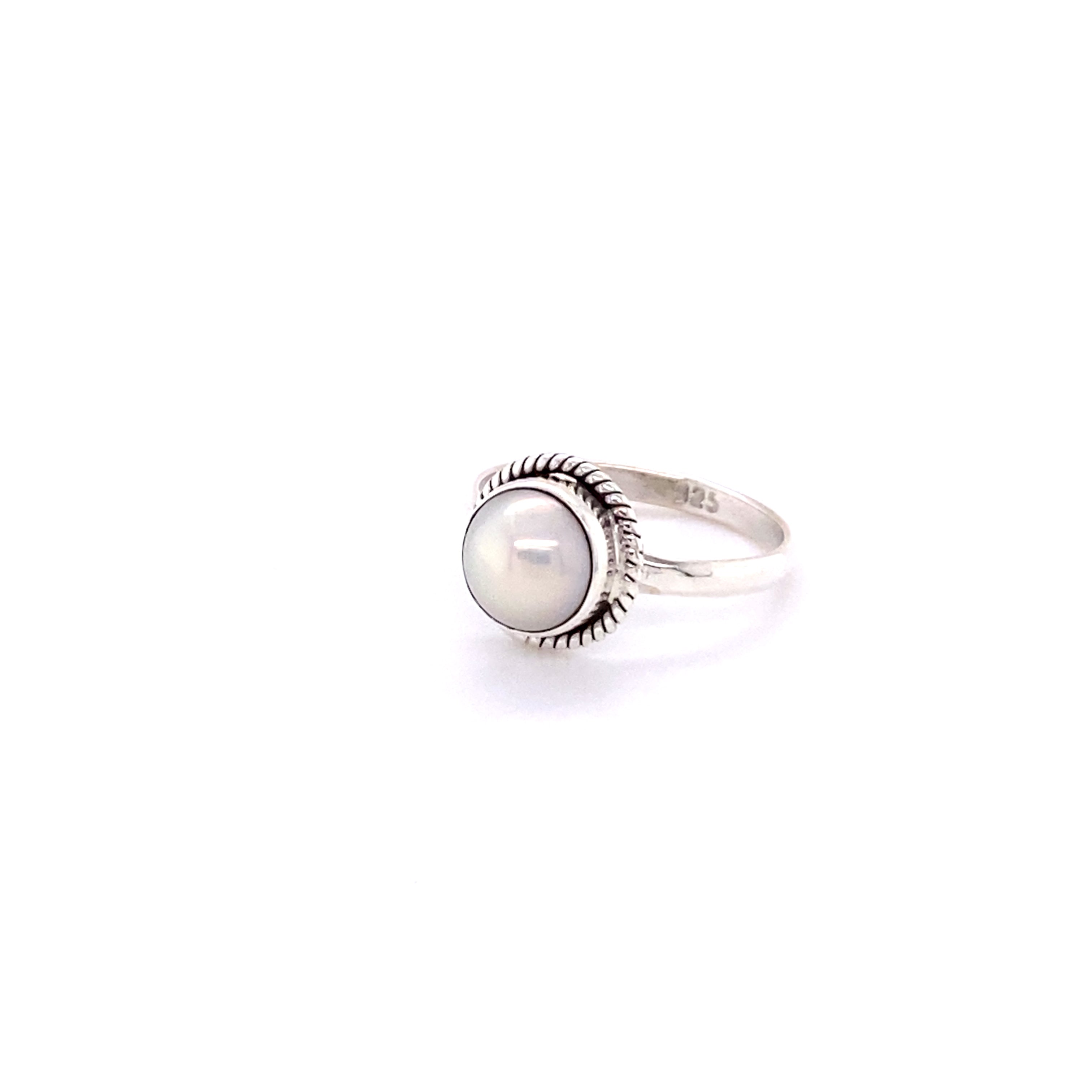 A Simple Oval Gemstone Ring with Twisted Rope Border with a central pearl set in a detailed metal bezel, displayed against a white background.