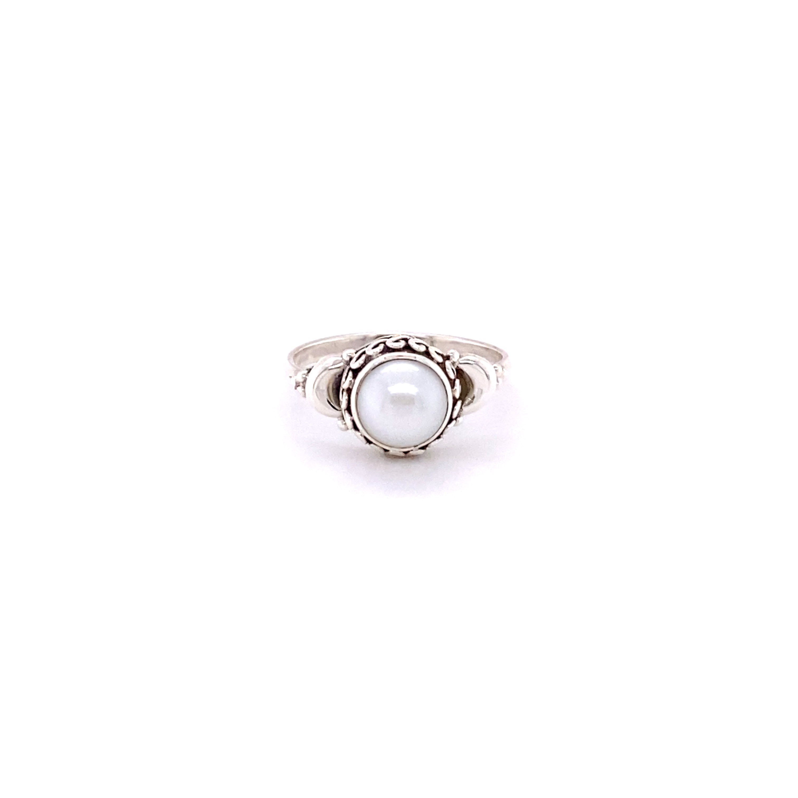 A Beautiful Oval Gemstone Ring with Small Moons on a white background, made of sterling silver.