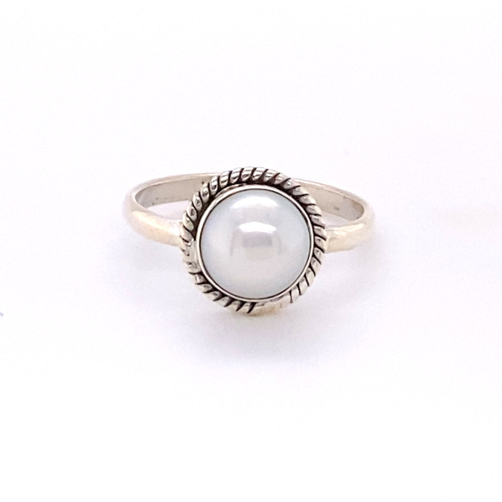 
                  
                    A Simple Round Gemstone Ring with Rope Border by Super Silver, featuring a white pearl, made of Sterling Silver, on a white background.
                  
                