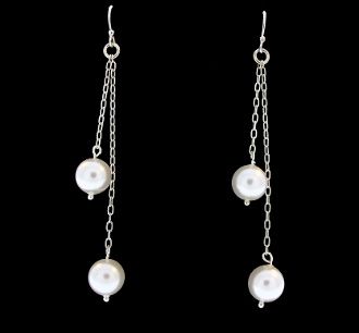 A pair of Super Silver Long Shell Pearl earrings with a rhodium finish.