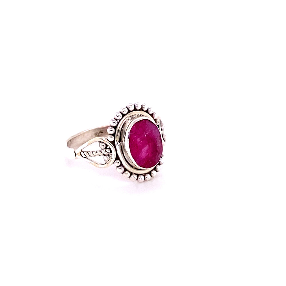 
                  
                    A boho-inspired sterling silver ring adorned with a beautiful Oval Gemstone with Ball Design.
                  
                