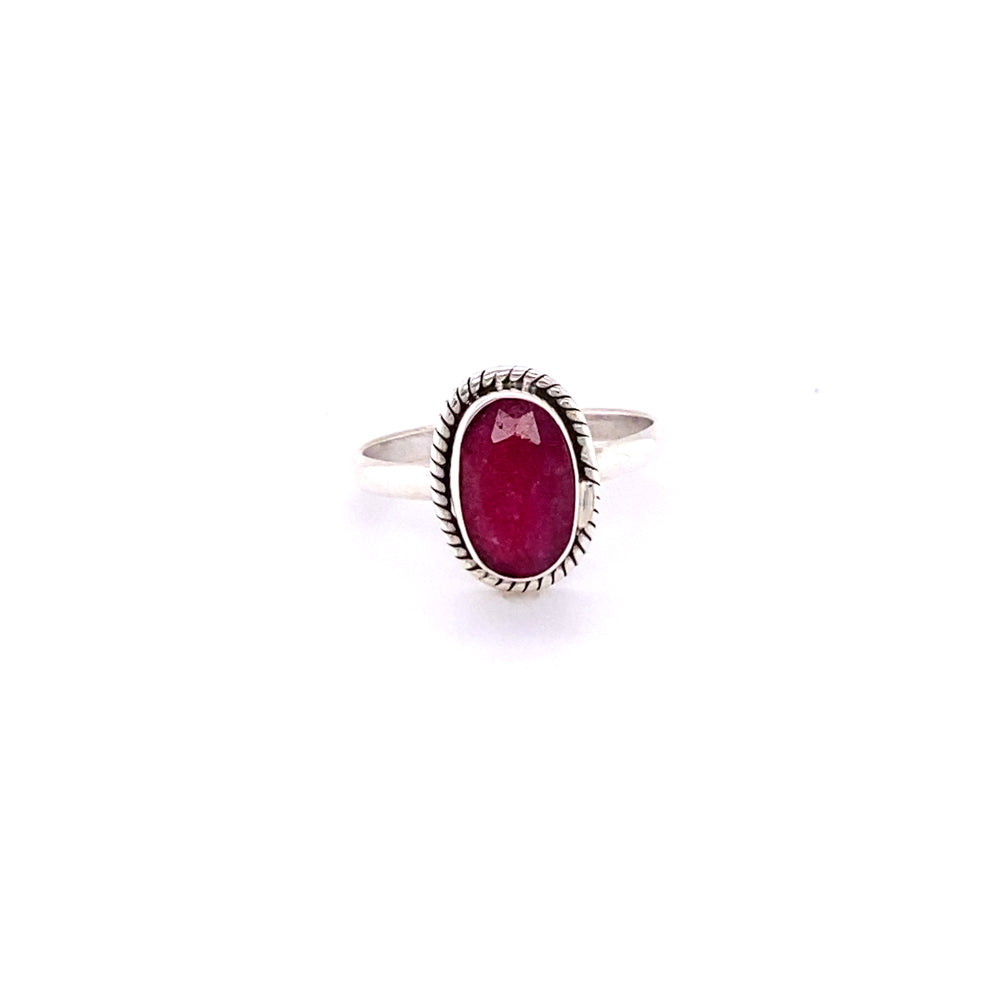
                  
                    Simple Oval Gemstone Ring with Twisted Rope Border
                  
                