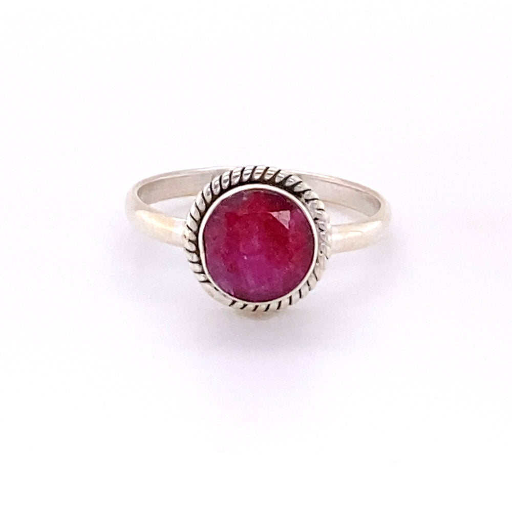 
                  
                    A Simple Round Gemstone Ring with Rope Border from Super Silver with a ruby gemstone.
                  
                