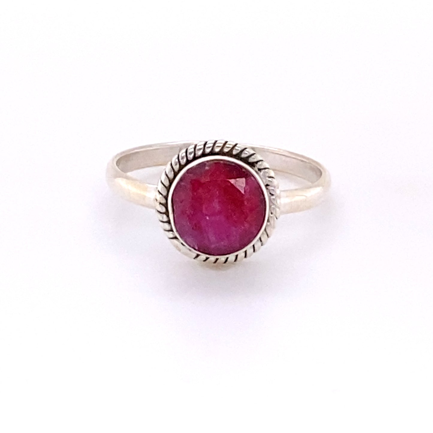 
                  
                    A Simple Round Gemstone Ring with Rope Border from Super Silver with a ruby gemstone.
                  
                