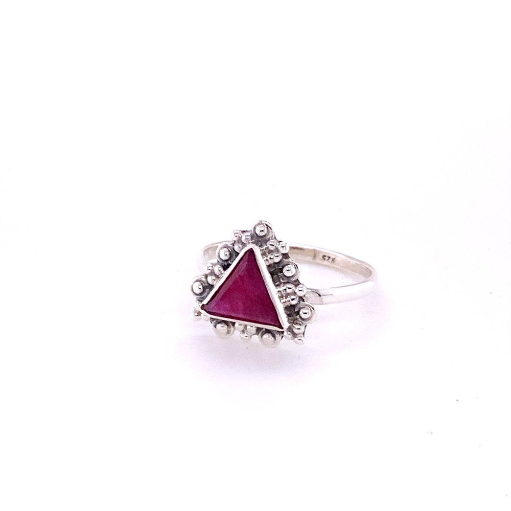 
                  
                    A Delicate Gemstone Triangle Ring from Super Silver with a ruby gemstone in the middle.
                  
                