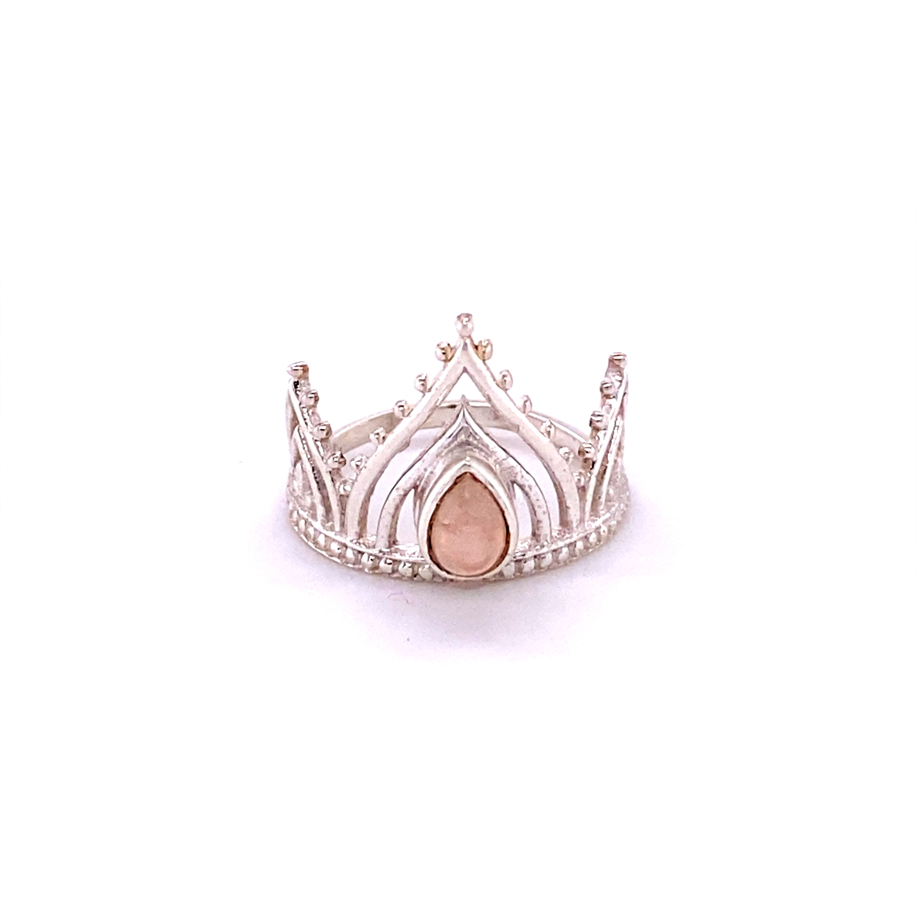 A Henna Crown Ring with Natural Gemstones adorned with a henna-style silverwork and featuring a rose quartz, the Super Silver Henna Crown Ring with Natural Gemstones.