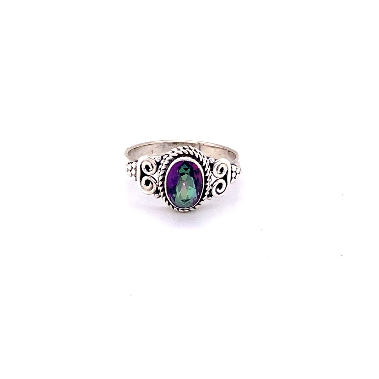 
                  
                    An Oval Faceted Gemstone Ring with a Swirl Design that exudes a hippie vibe.
                  
                