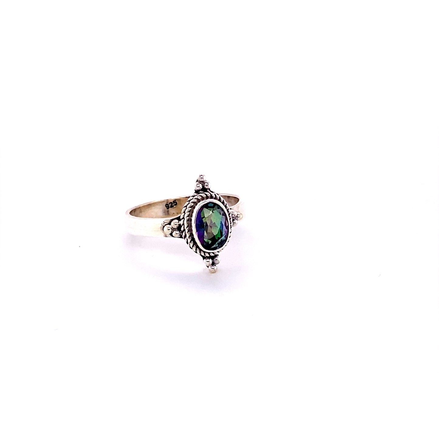
                  
                    A Four Points Gemstone Ring with a colorful cabochon stone.
                  
                