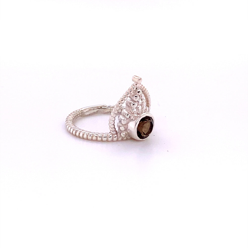 
                  
                    A Simple Tiara Ring with Natural Gemstones from Super Silver, featuring a smoky quartz stone.
                  
                