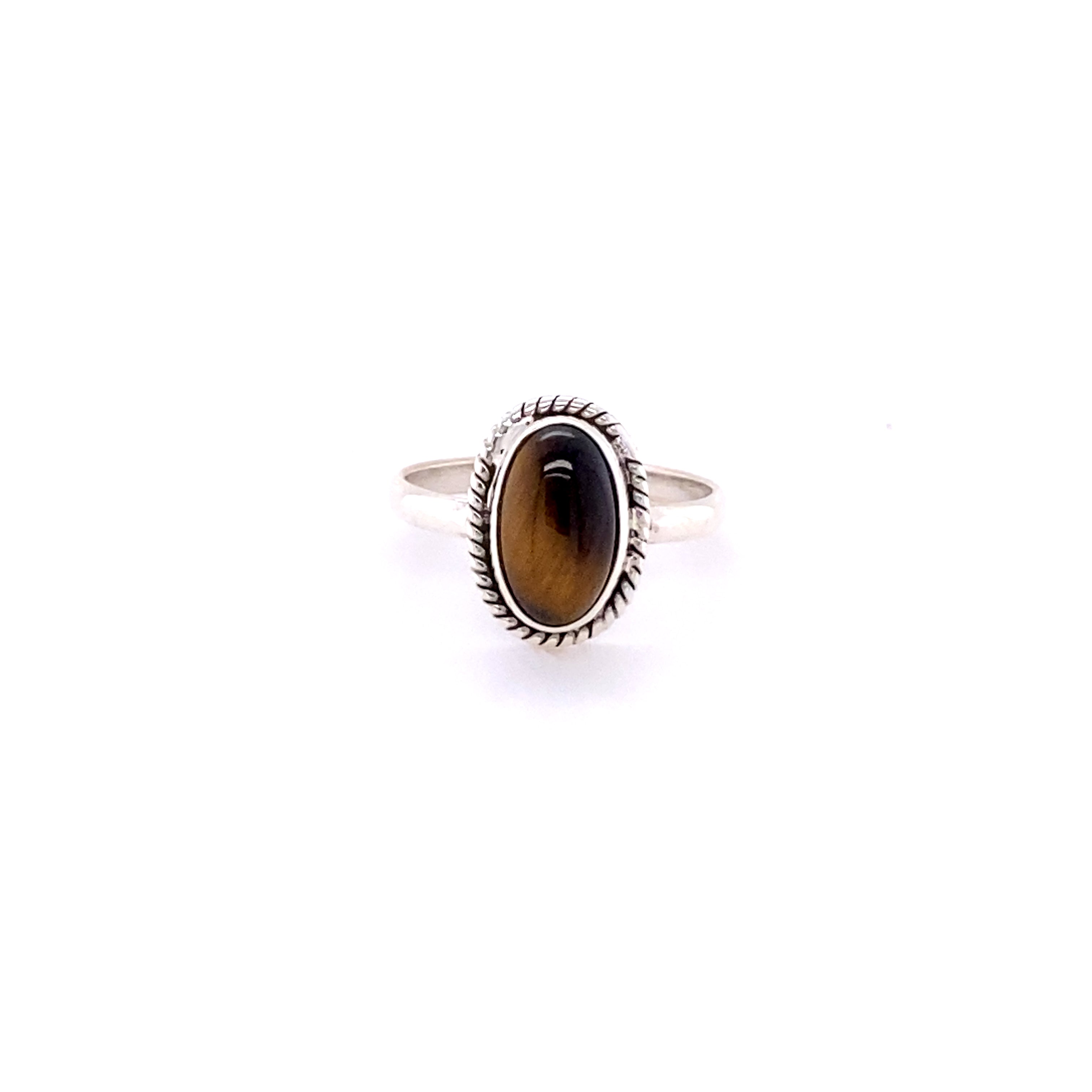 Simple Oval Gemstone Ring with Twisted Rope Border featuring a Tiger's Eye Gemstone set in a detailed, serrated bezel on a plain band, isolated on a white background.