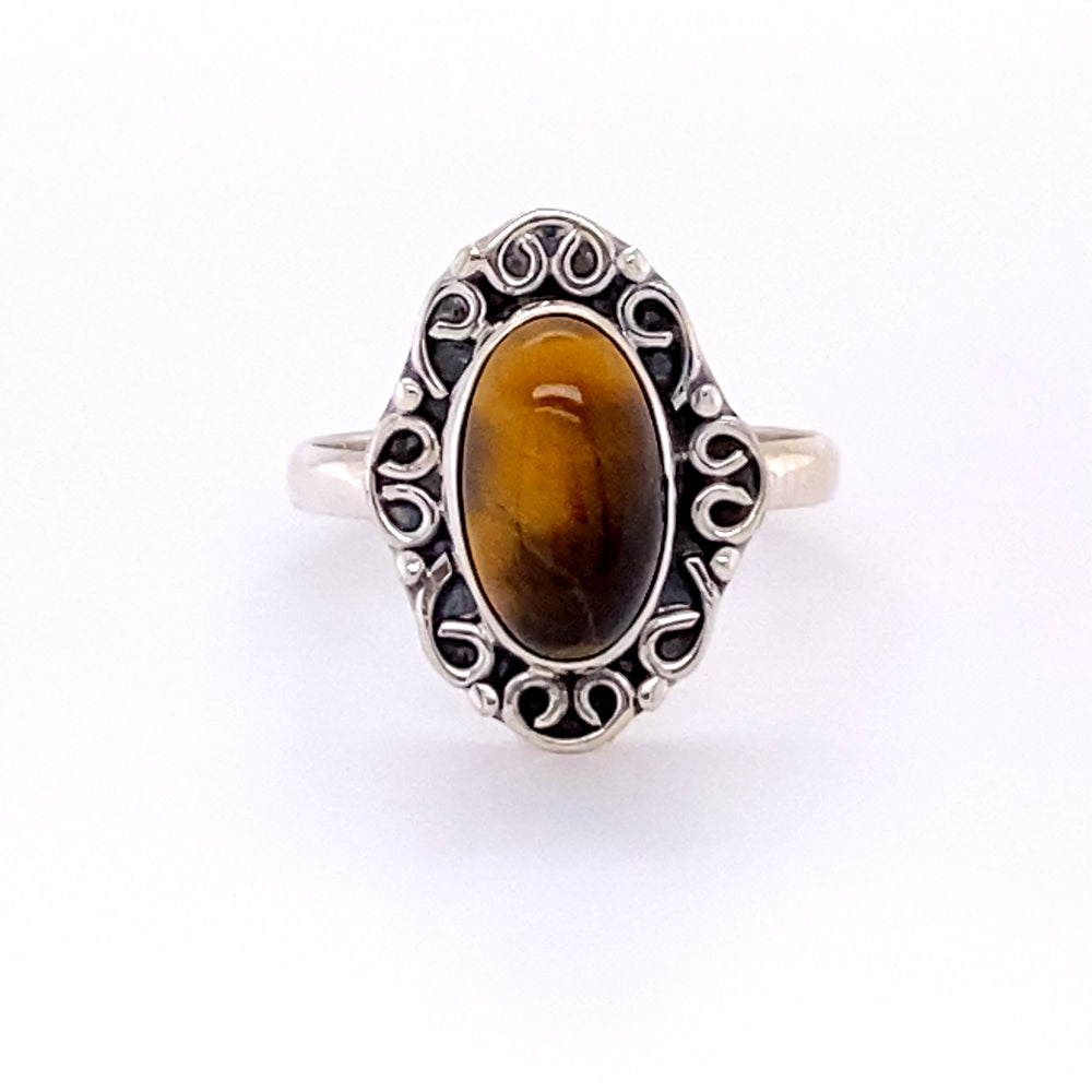 
                  
                    A silver Oval Gemstone Ring with Swirl Filigree Border, giving off a Santa Cruz hippie vibe.
                  
                