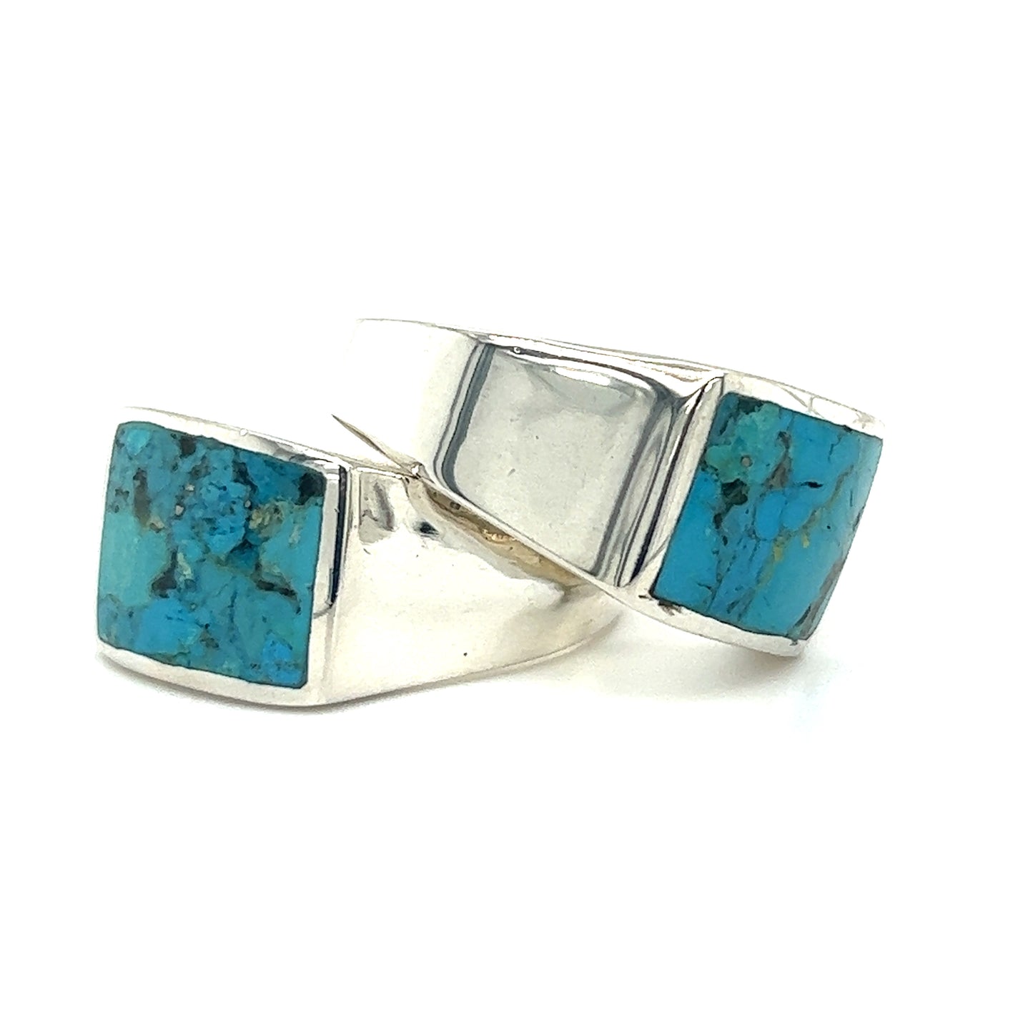 A pair of Super Silver Kingman Turquoise Signet Rings.