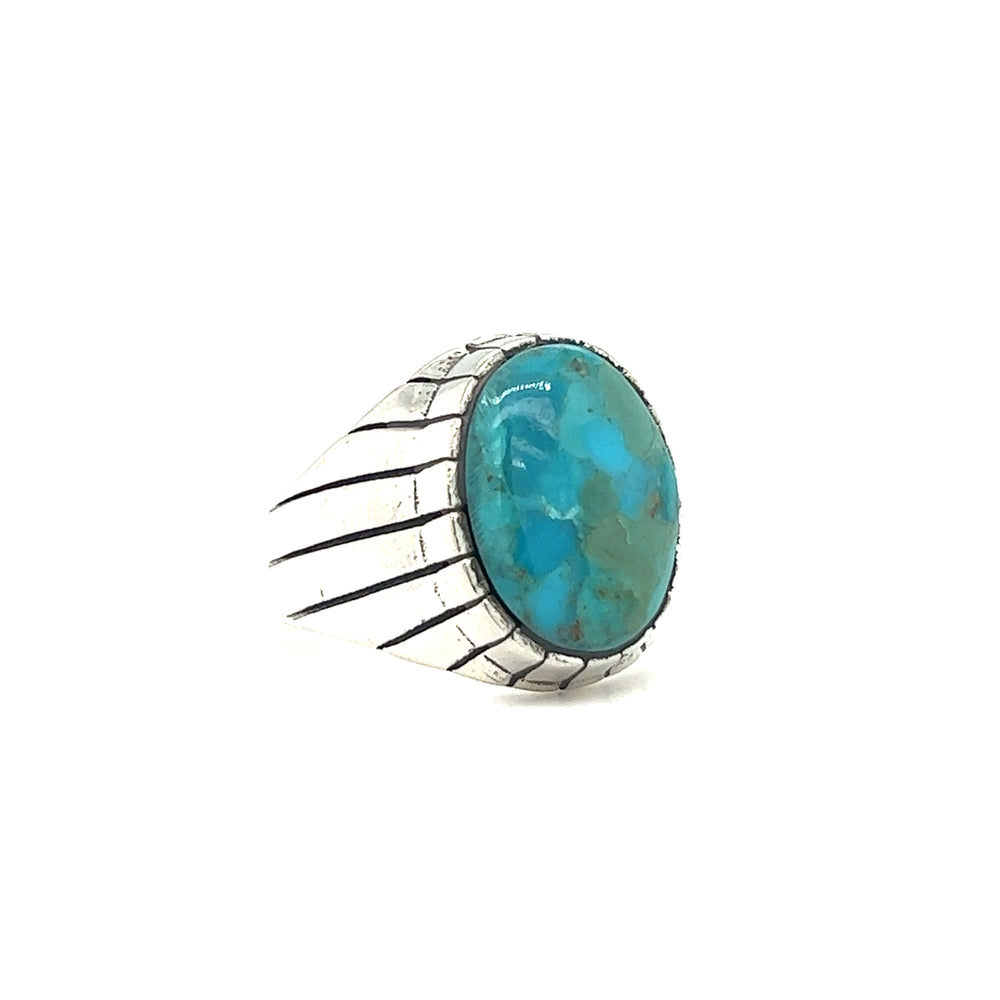 
                  
                    A Kingman Turquoise Oval Signet Ring crafted in sterling silver by Super Silver.
                  
                