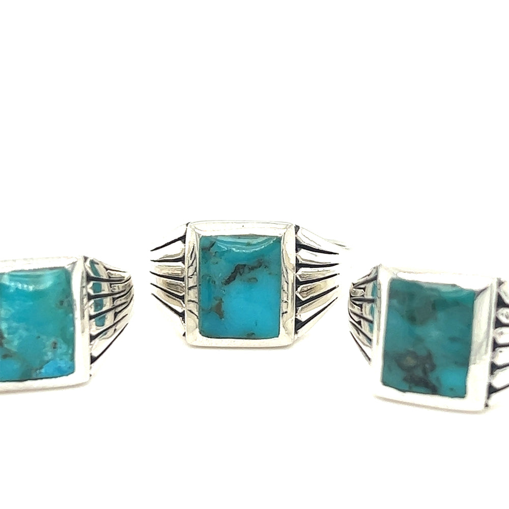 
                  
                    A Super Silver Square Kingman Turquoise Signet Ring.
                  
                
