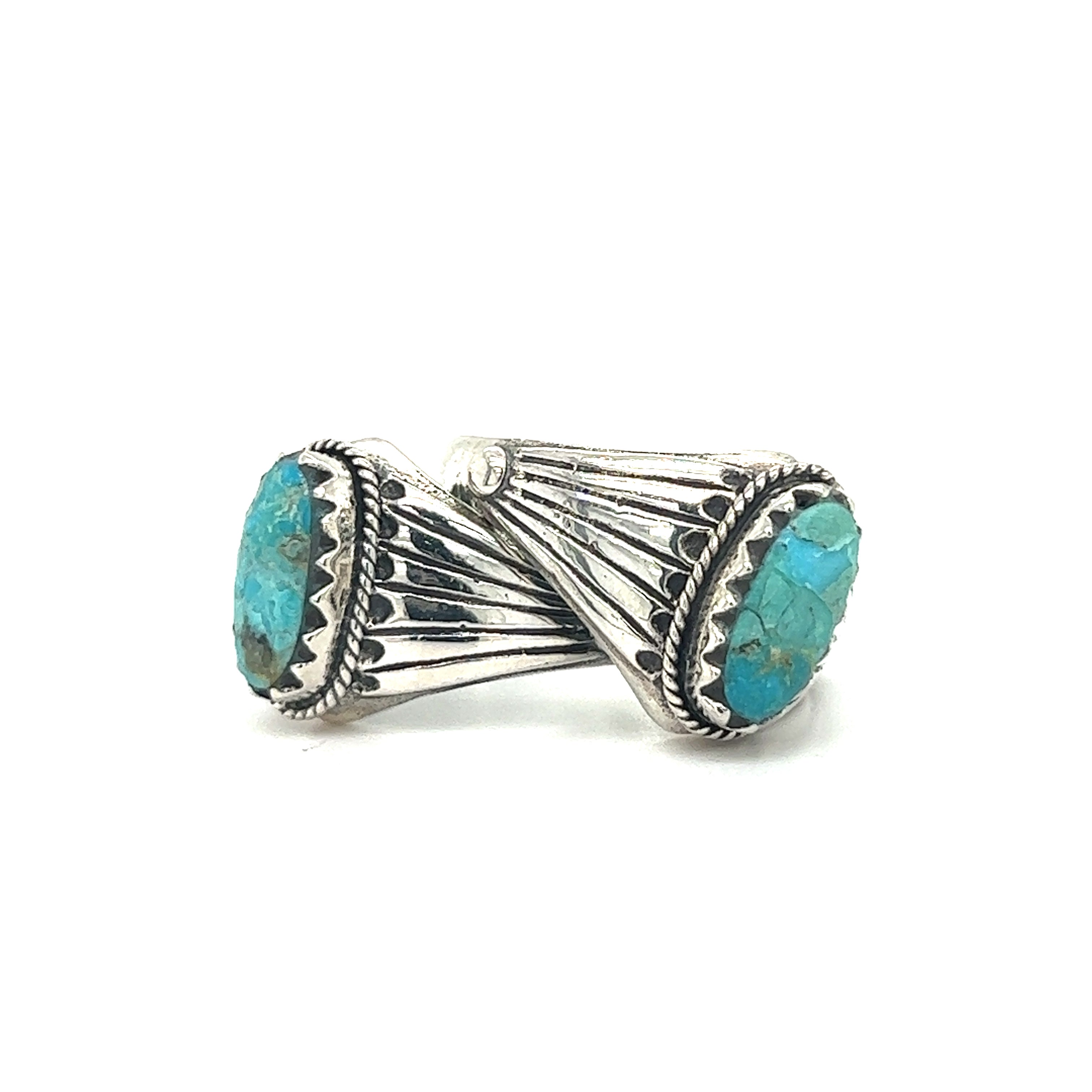 A pair of minimalist silver rings with Southwest Inspired Kingman Turquoise stones.
