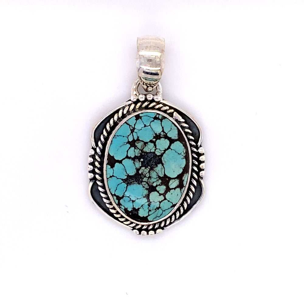 
                  
                    Super Silver presents the Natural Turquoise Pendant with an Oval Shield Setting.
                  
                