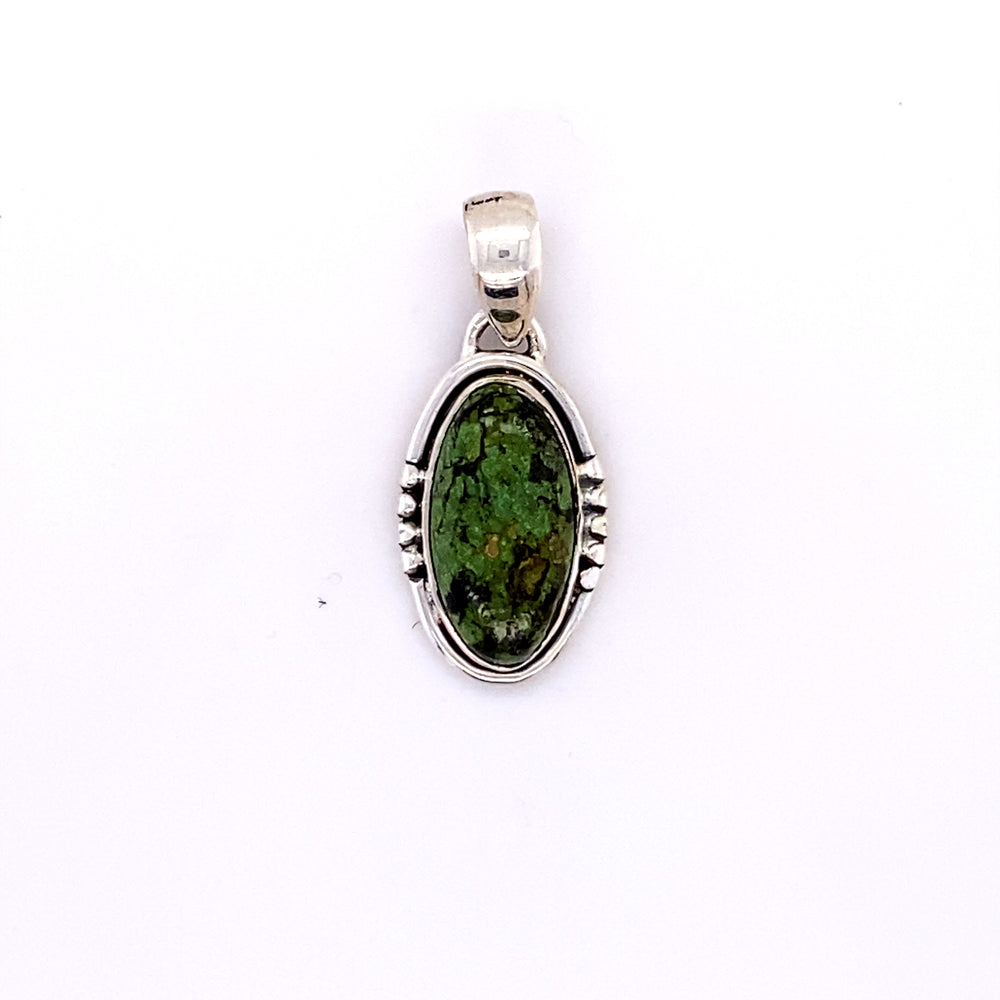 
                  
                    A Super Silver Natural Turquoise Elongated Oval Pendant with a green stone in it.
                  
                