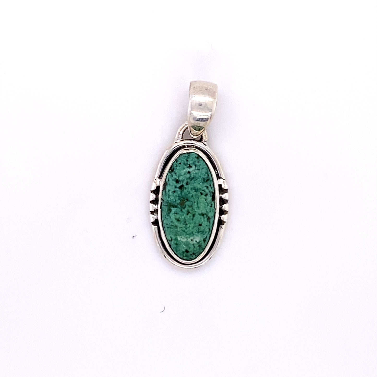 
                  
                    A Super Silver Natural Turquoise Elongated Oval Pendant.
                  
                