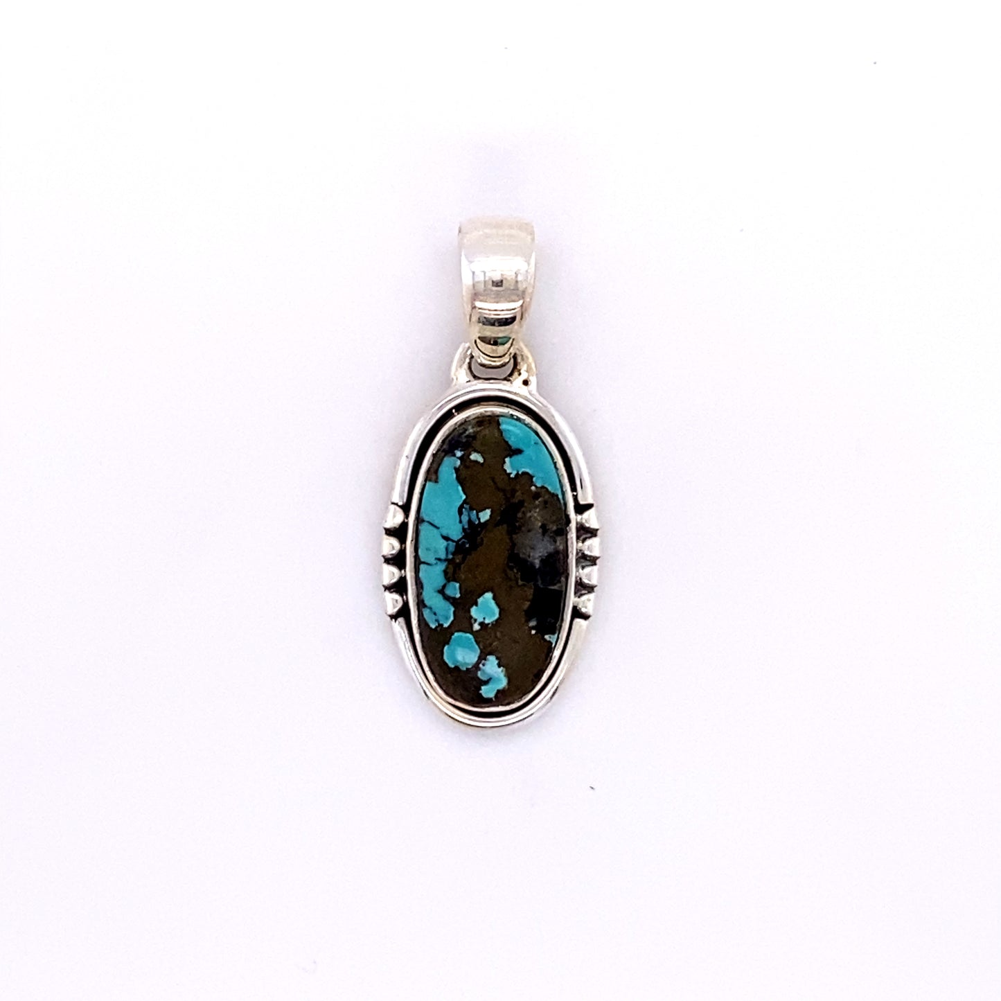 
                  
                    This Super Silver handmade sterling silver pendant showcases the Natural Turquoise Elongated Oval Pendant.
                  
                