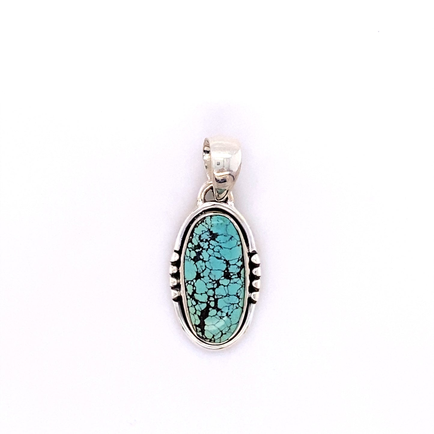 
                  
                    A Super Silver handmade sterling silver pendant with a Natural Turquoise Elongated Oval stone.
                  
                