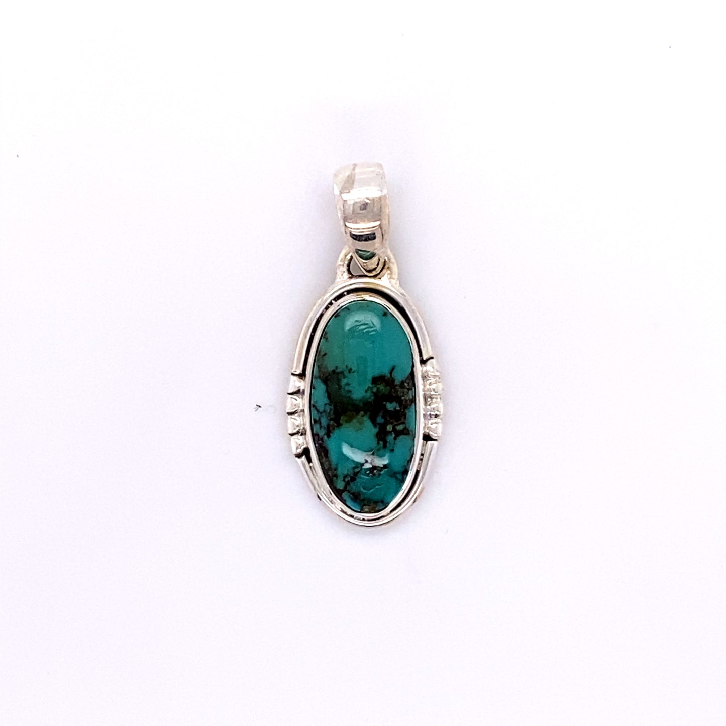 
                  
                    A Super Silver handmade elongated oval pendant with a stunning Natural Turquoise stone.
                  
                