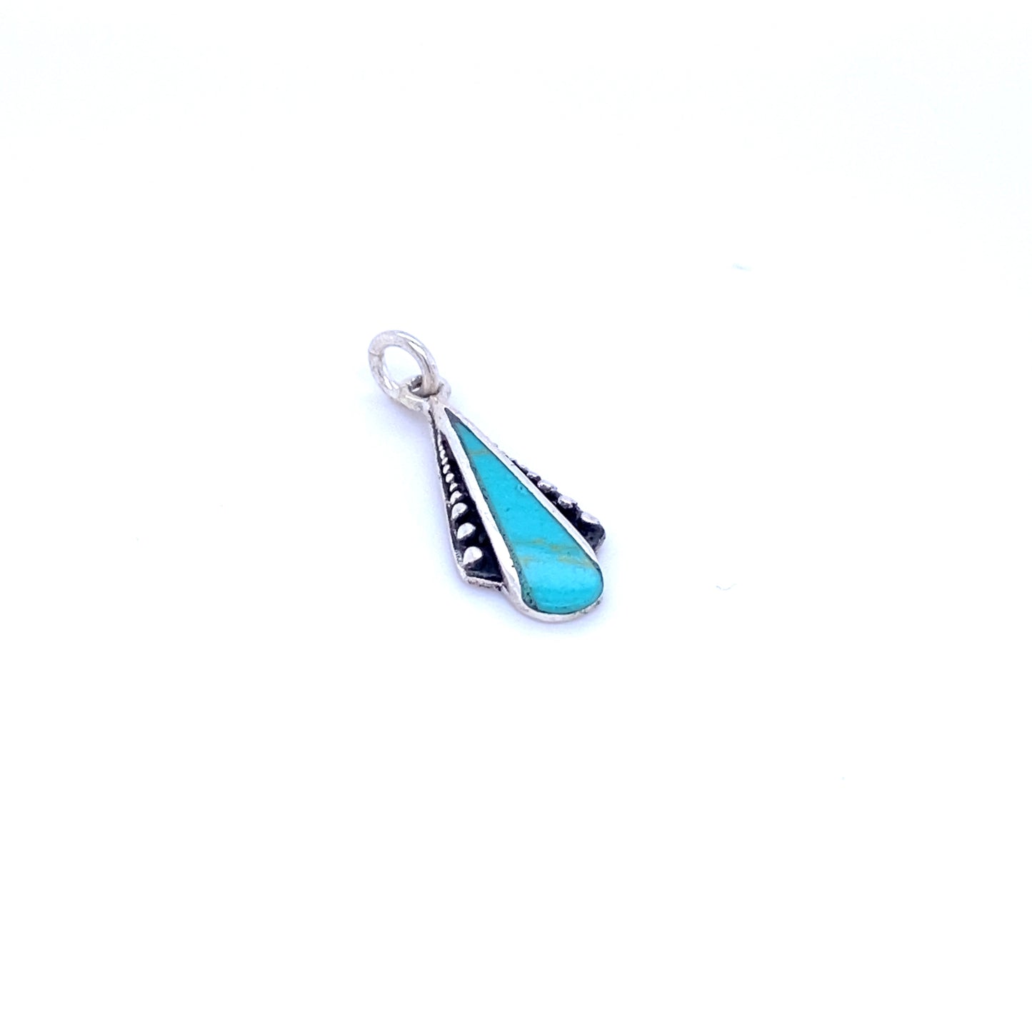 
                  
                    A dainty Super Silver Teardrop Pendant with Inlaid Stones and Ball Border on a white background.
                  
                