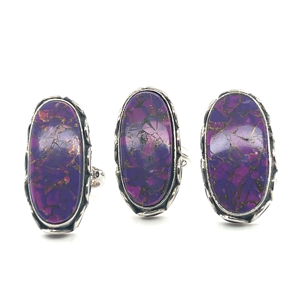 
                  
                    A pair of Super Silver Statement Purple Turquoise Rings featuring a composite turquoise stone.
                  
                