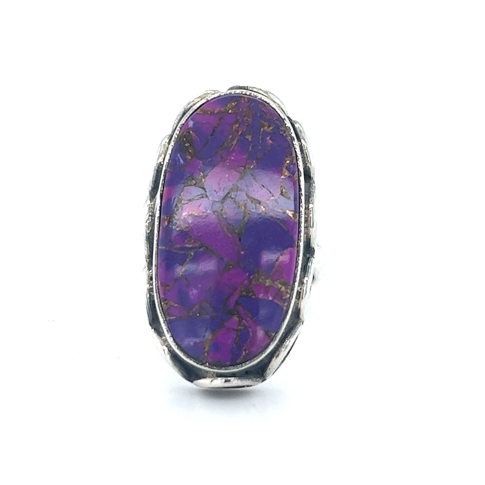 
                  
                    A Super Silver Statement Purple Turquoise Ring featuring a vibrant purple stone on a crisp white background.
                  
                