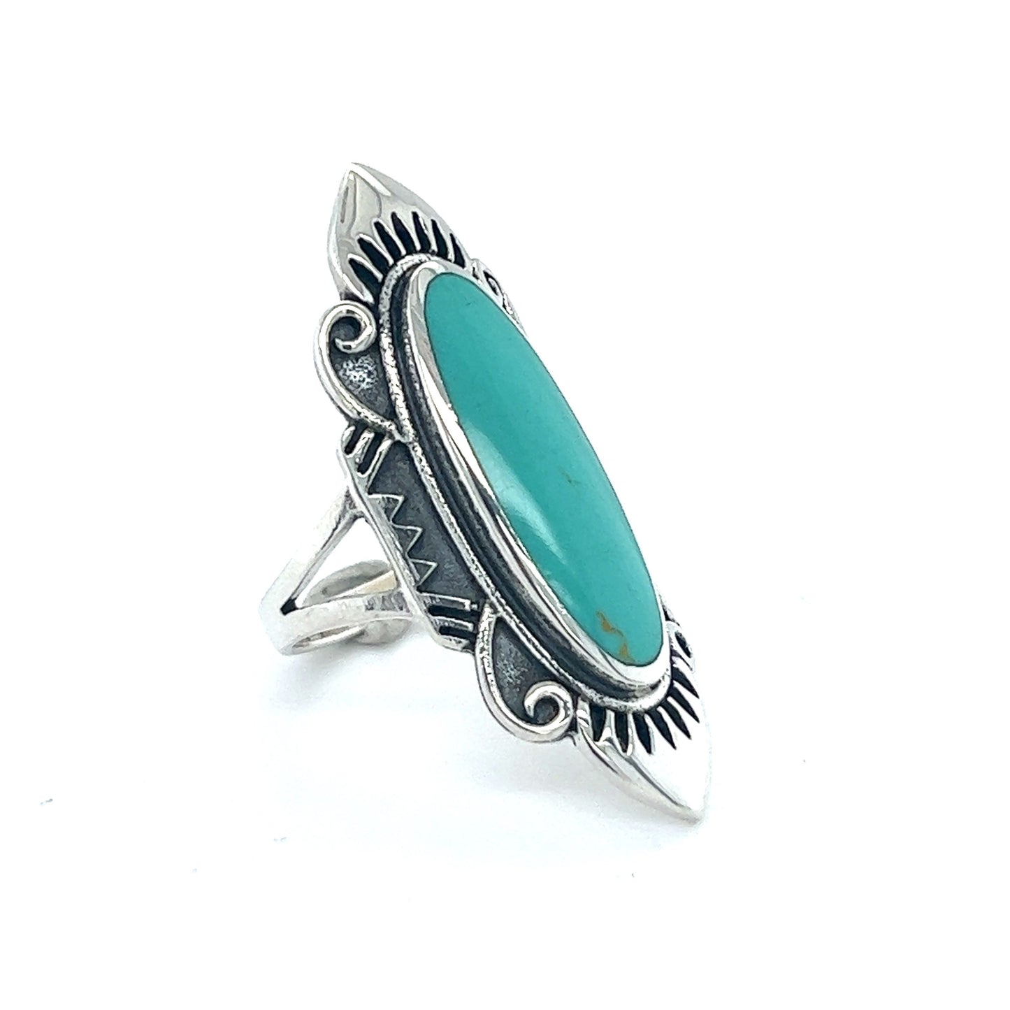 
                  
                    A Southwest Styled Turquoise Statement Ring with Super Silver charm.
                  
                
