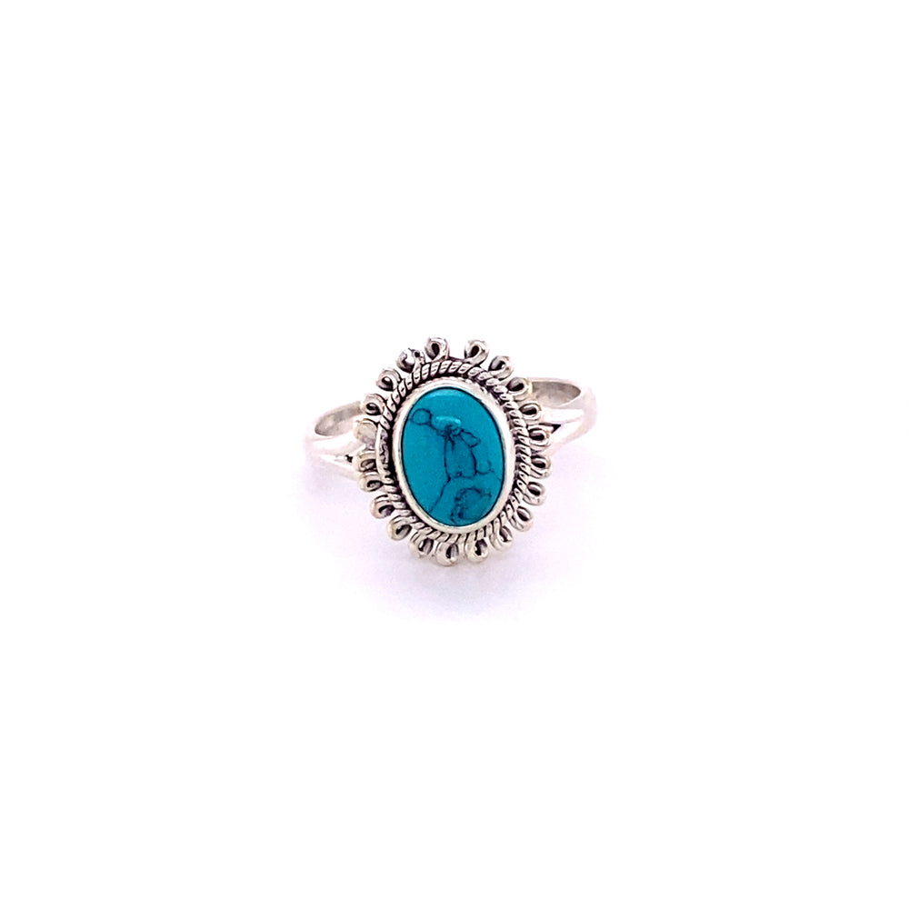 
                  
                    A Hippie-Chic Oval Gemstone Flower Ring with a turquoise cabochon stone.
                  
                