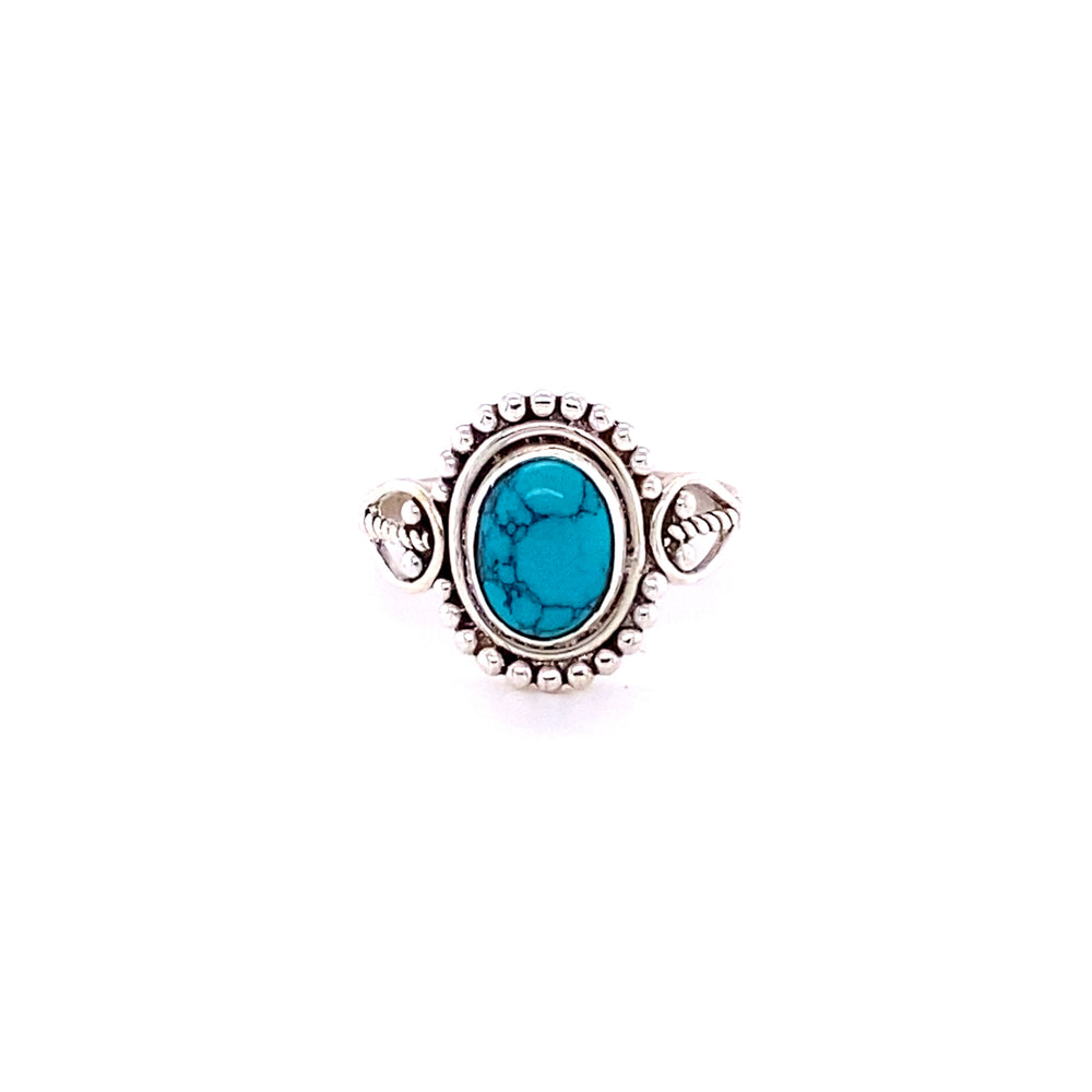 
                  
                    A boho silver ring with an oval gemstone with ball design.
                  
                