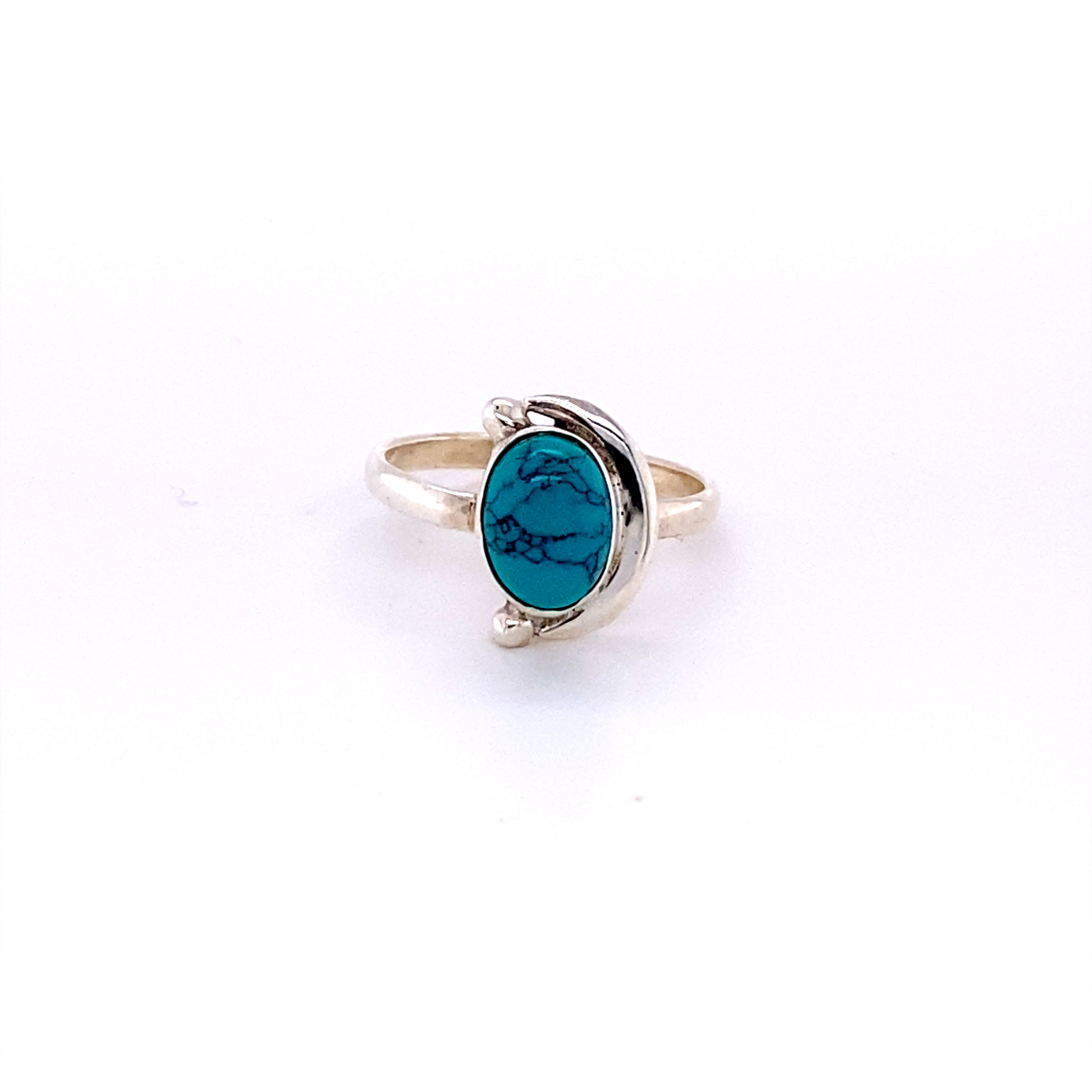 An Oval Crescent Moon Ring with Natural Gemstones bearing a turquoise stone in the middle, perfect for Santa Cruz vibes.