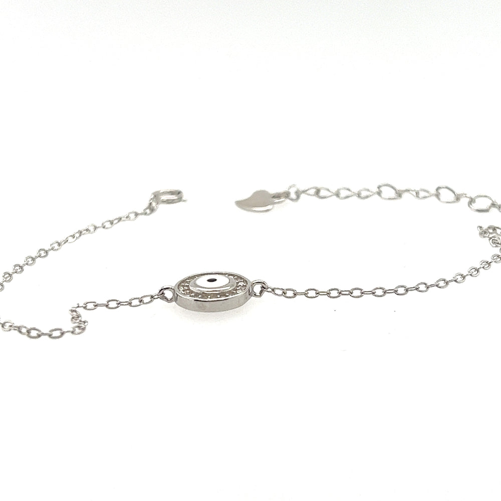 
                  
                    A Delicate Cubic Zirconia Evil Eye Bracelet adorned with an evil eye by Super Silver.
                  
                