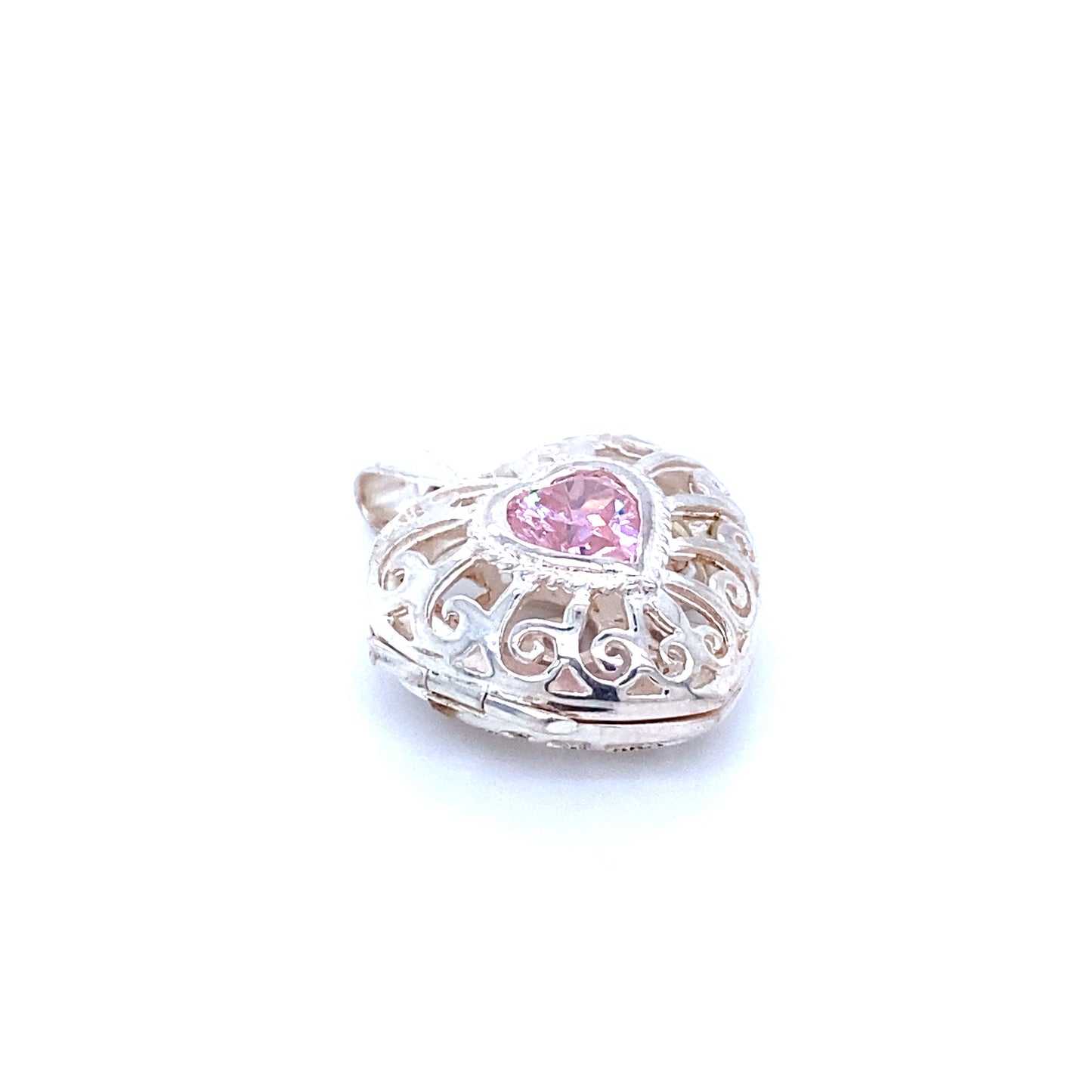 
                  
                    A Super Silver Heart Cage Locket With Cubic Zirconia Stones pendant with a filigree design and pink sapphires.
                  
                