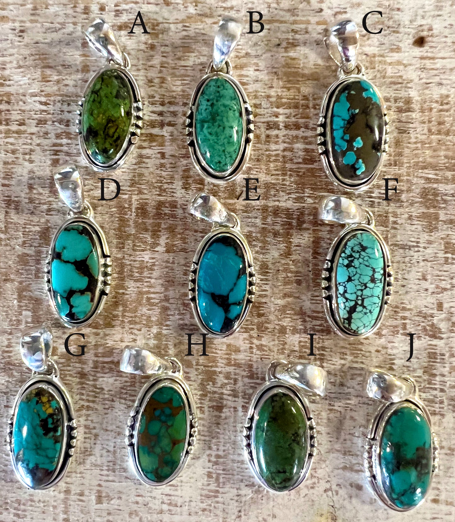 
                  
                    Handmade Natural Turquoise Elongated Oval Pendants on a Super Silver sterling silver chain.
                  
                