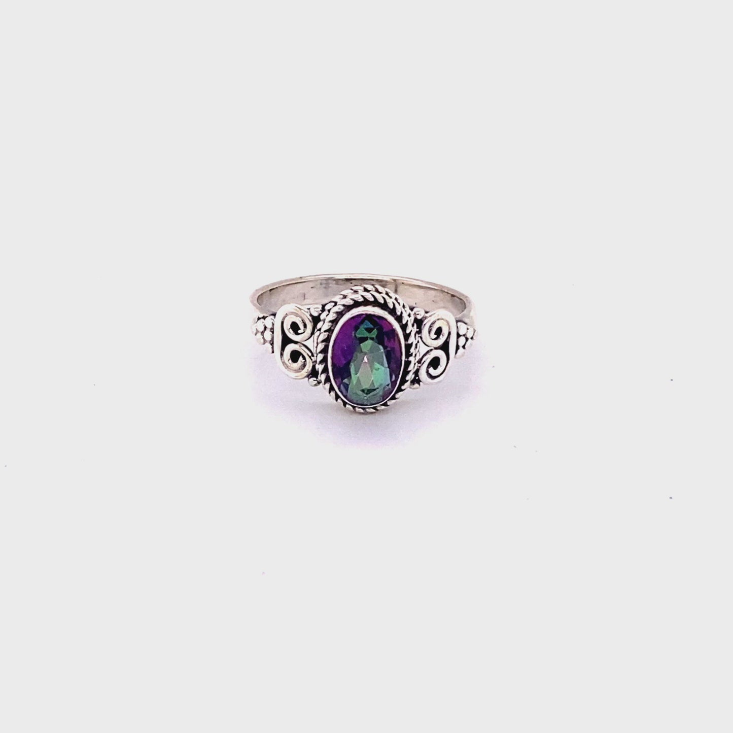 
                  
                    Load and play video in Gallery viewer, Oval Faceted Gemstone Ring with a Swirl Design
                  
                