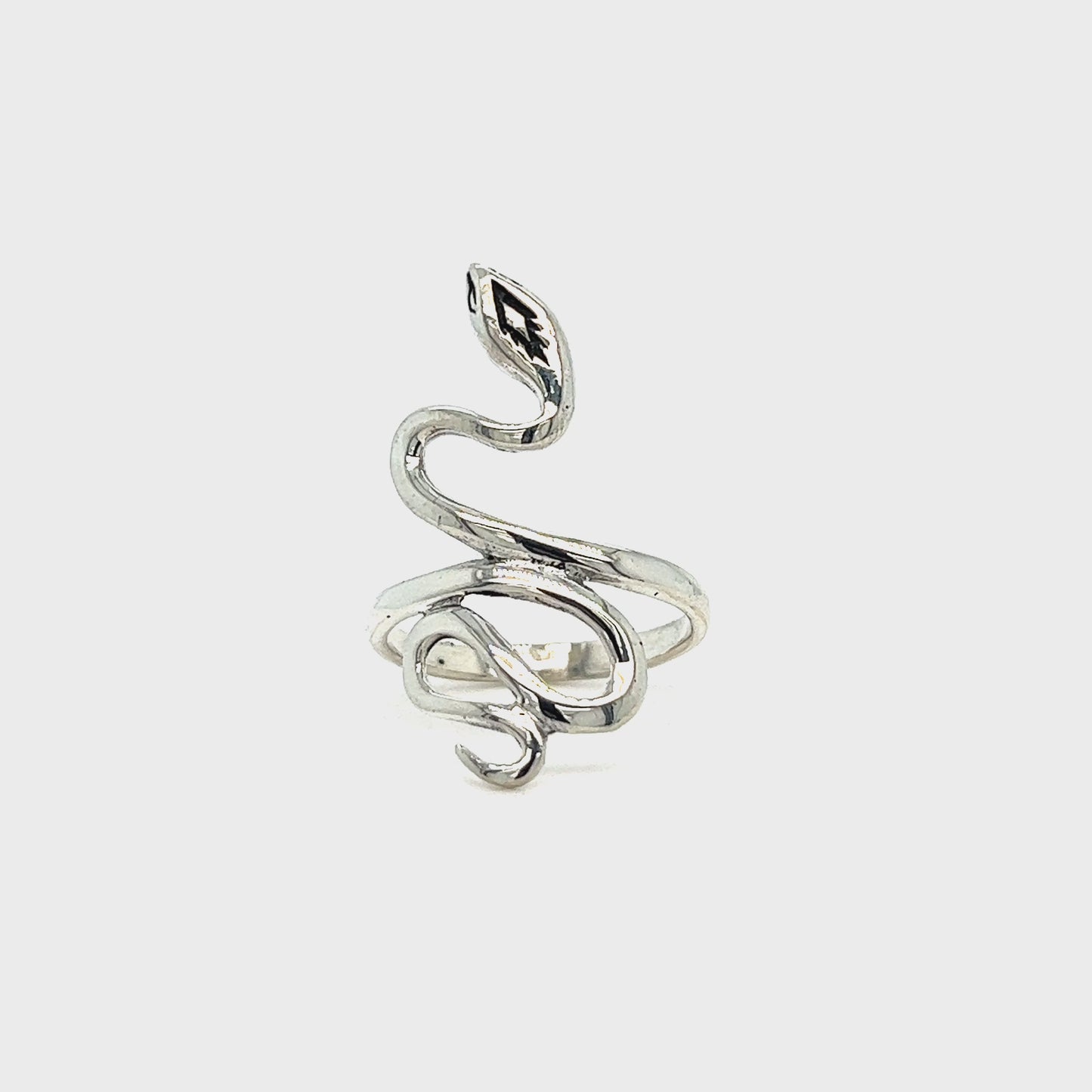 
                  
                    Load and play video in Gallery viewer, Coiled Snake Ring With Fine Finish
                  
                