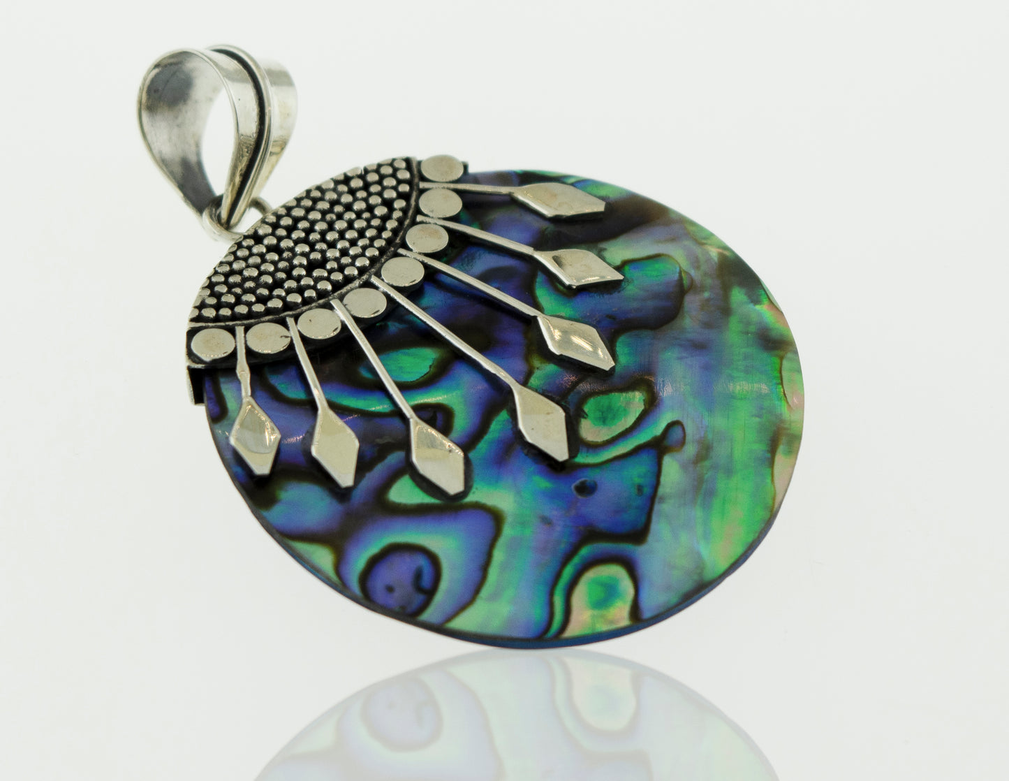 A Super Silver Circle Abalone Pendant with Bali detail made of .925 Sterling Silver, placed on a white surface.