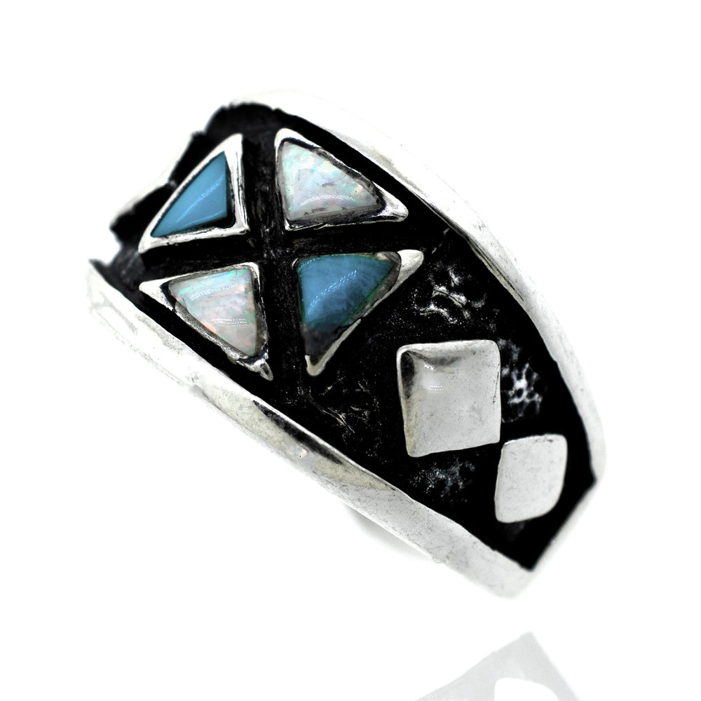 A Super Silver American Made Men's Opal and Turquoise Ring with a blue stone and diamonds.
