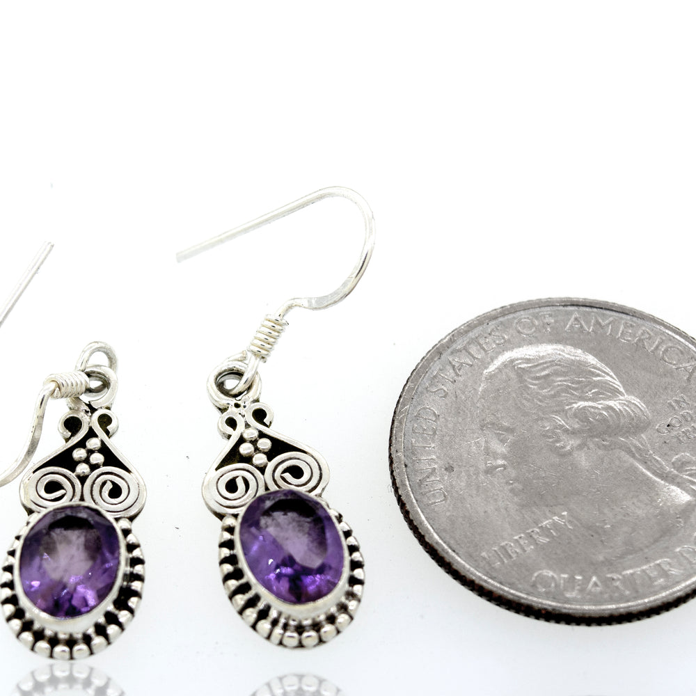 
                  
                    Super Silver oval amethyst earrings with ball border.
                  
                