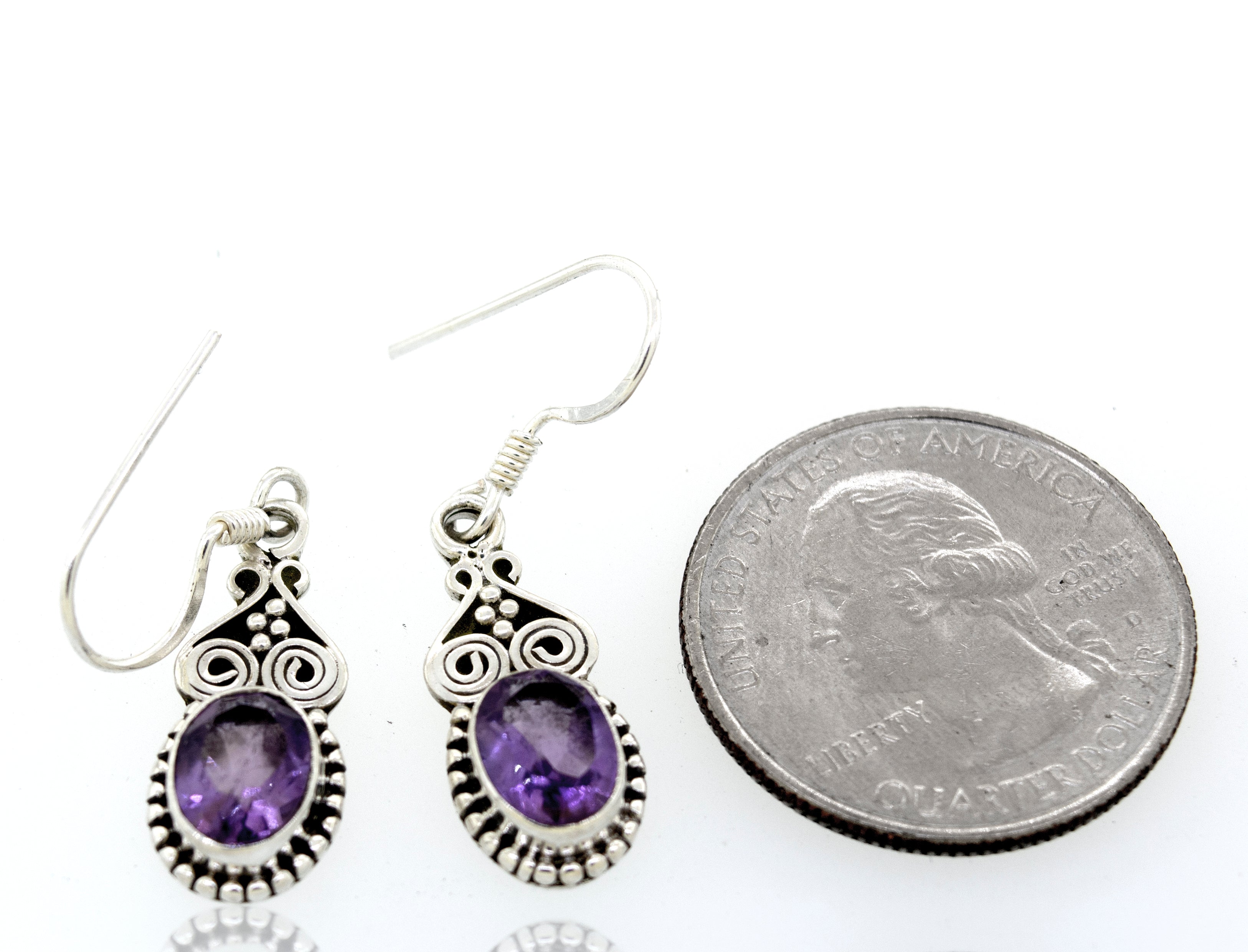 Super Silver oval amethyst earrings with ball border.