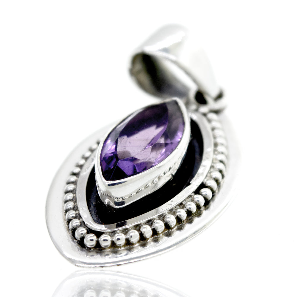 
                  
                    Beautiful Marquise Shaped Amethyst Pendant With Beads Design featuring a stunning amethyst stone set in sterling silver by Super Silver.
                  
                