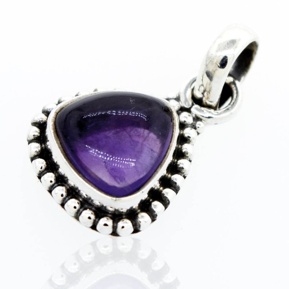 Beautiful Triangular Shape Amethyst Pendant With Beads Design in a Super Silver setting.
